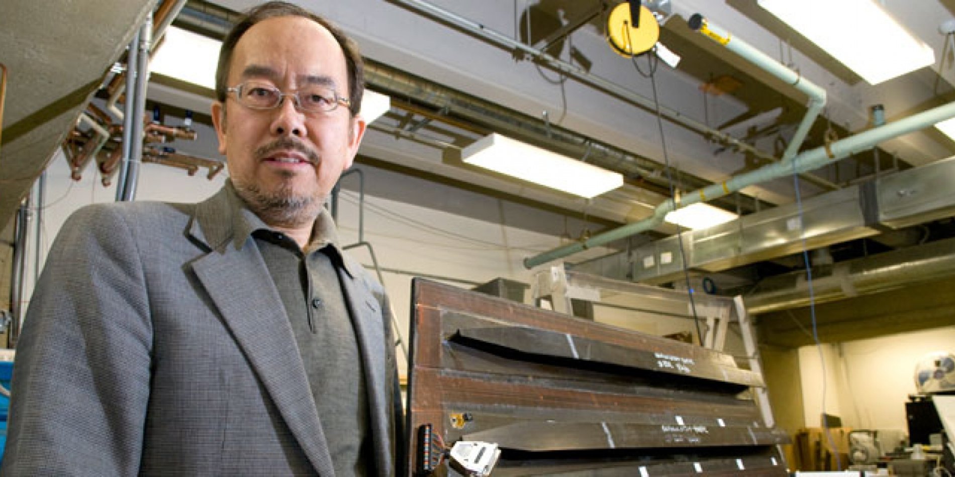 
Stanford Professor Fu-Kuo Chang with a carbon-fiber panel that contains an early form of structural health monitoring sensor. Newer sensors would be embedded directly into the material and not visibl
