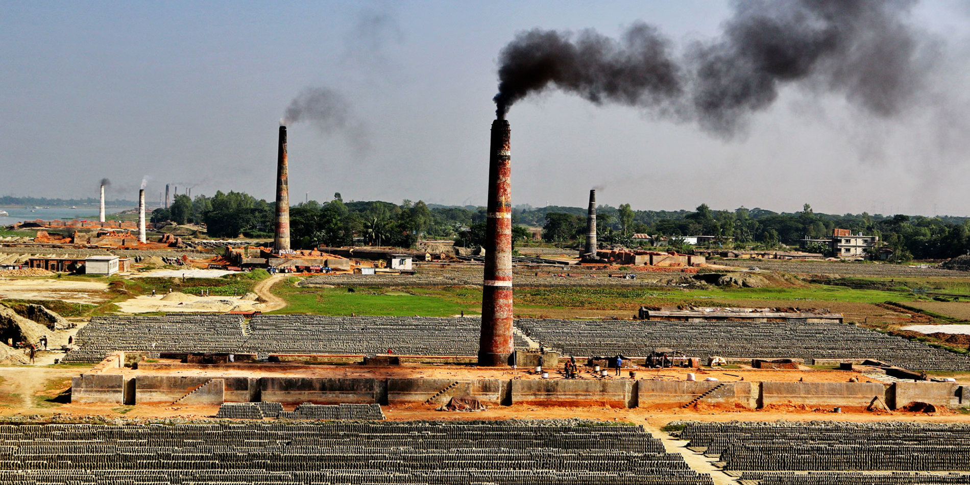 
A brick factory chimney belches black smoke in Bangladesh. | Photo by iStock/Farid_Ahmed