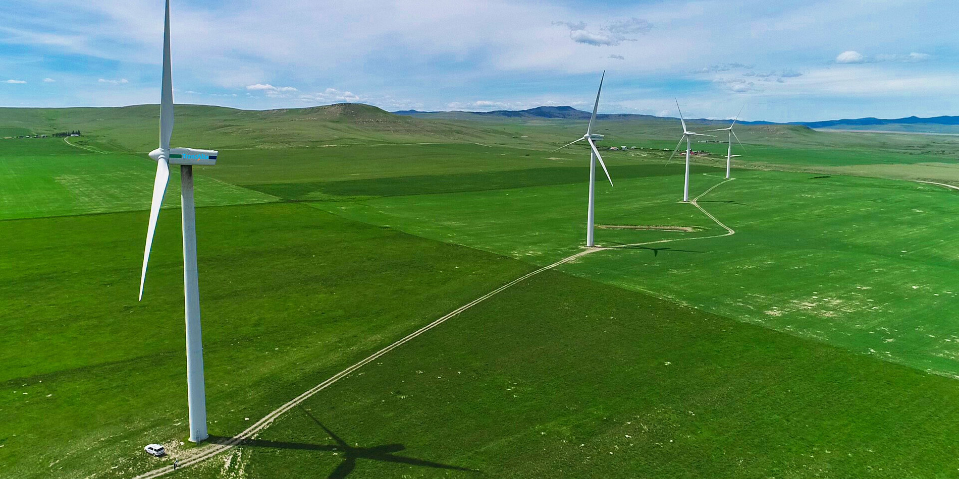 
The wake caused by a turbine pointing directly into the wind reduces the output of those behind it. | Image courtesy of Calgary Drone Photography