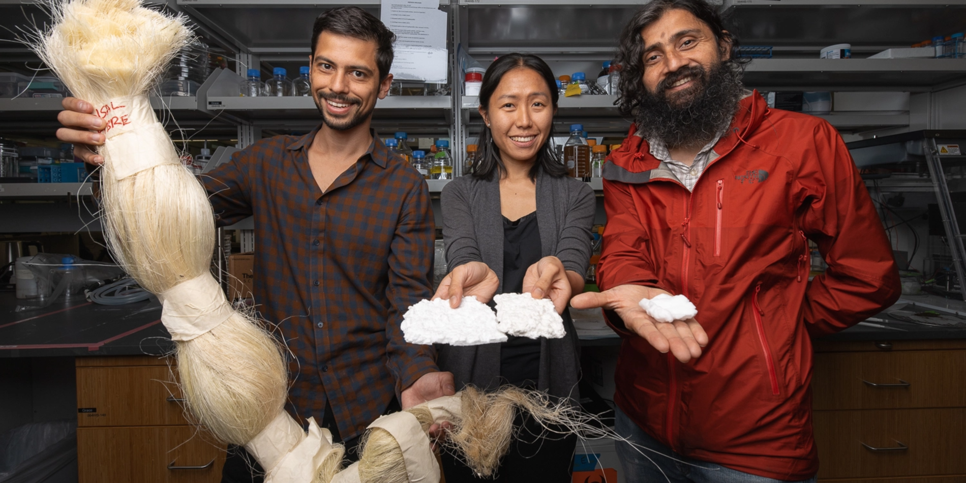 From left, Anton Molina, Anesta Kothari, and Manu Prakash show the sisal fiber and the cotton-like material they’ve produced from the sisal.