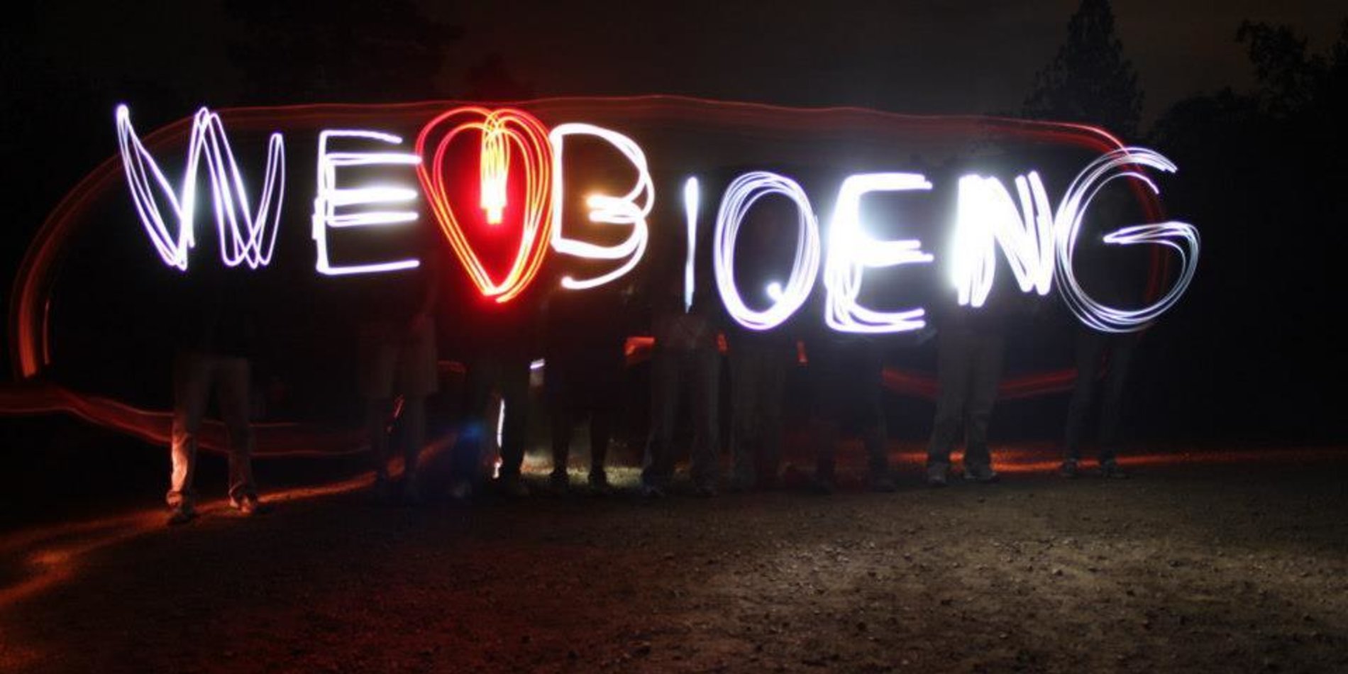 The phrase, “We love BioEng” in lights at night. 