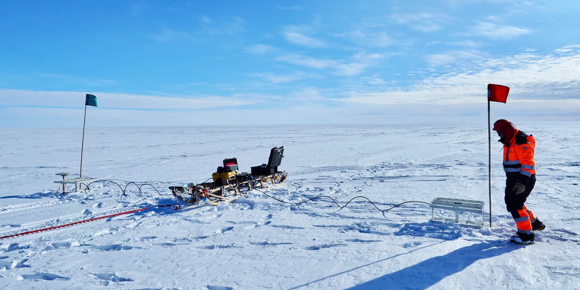 Scientist working with radar on ice.
