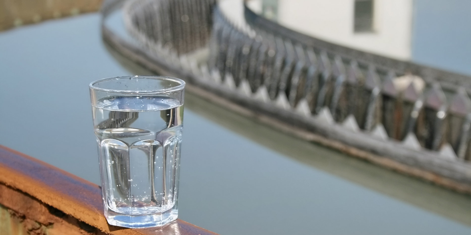 A glass of purified water at wastewater treatment plant.
