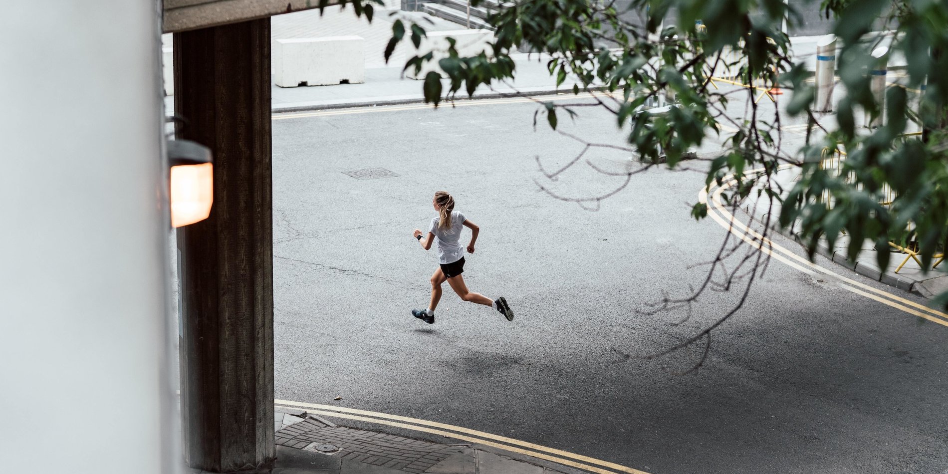 Woman running on the street. 