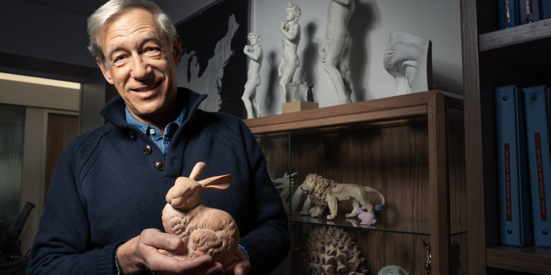 Marc Levoy holding the original terra cotta bunny in his office. 