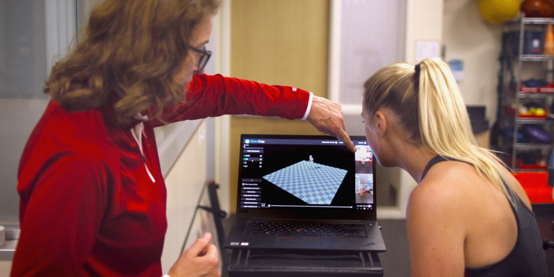 Occupational therapist Julie Muccini reviews an OpenCap capture with a study subject.