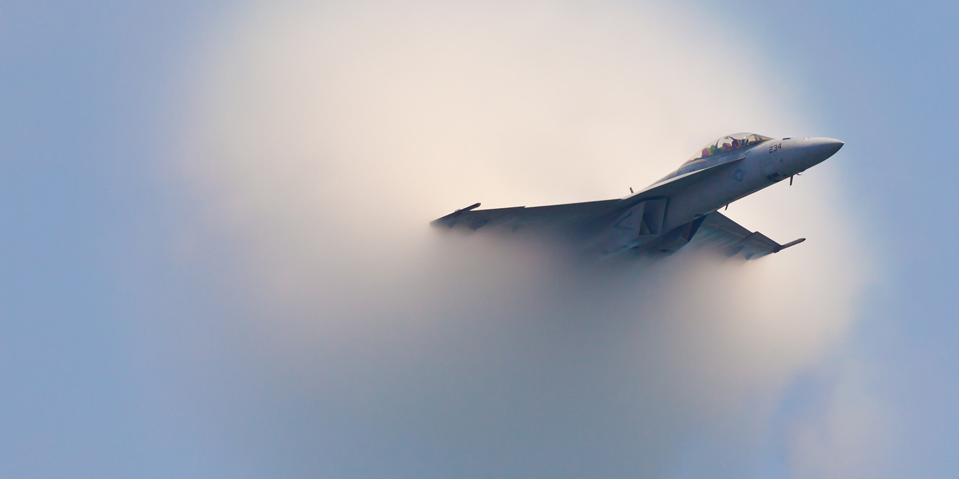 Photo of an F/A-18 Super Hornet flying at subsonic speed.