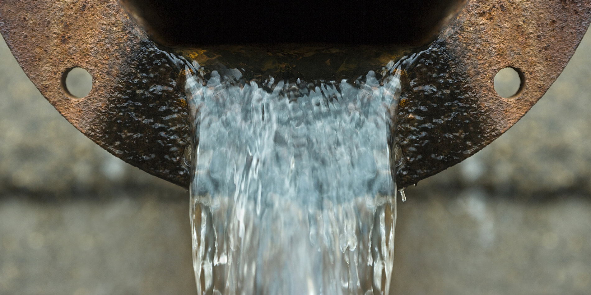 Close-up photo of a sewage drain.