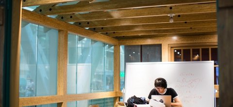 Student studying in HP garage in Huang